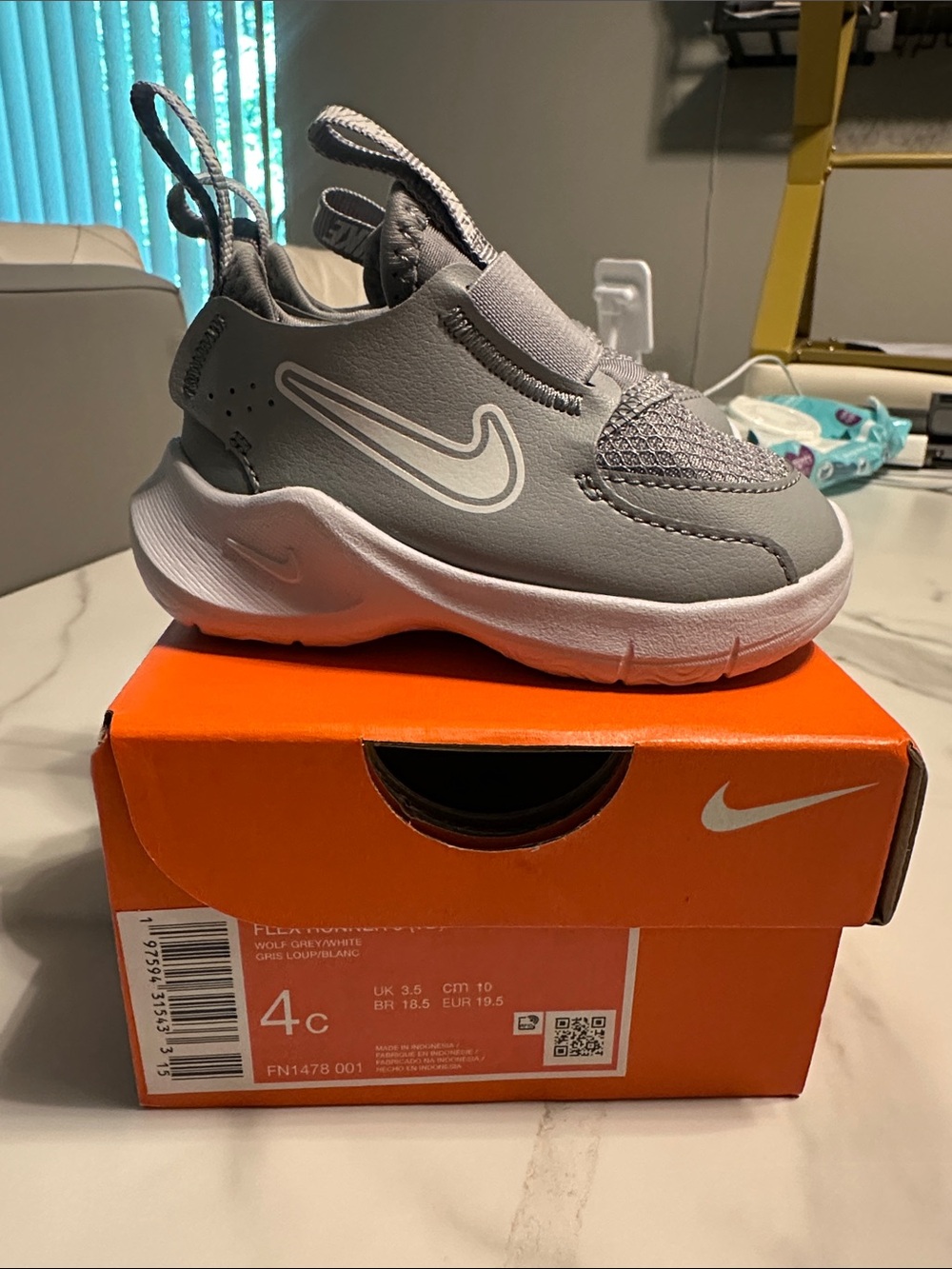 Nike Kids Grey Slip-On Athletic Sneakers with White Sole
